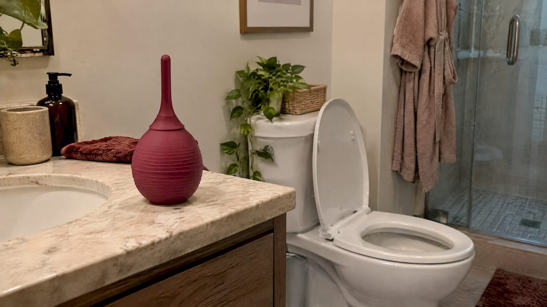 Bulb douche prepared beside a home toilet