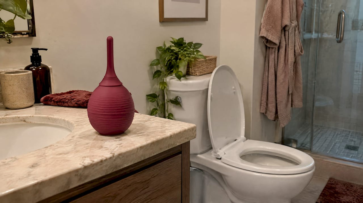 Bulb douche prepared beside a home toilet
