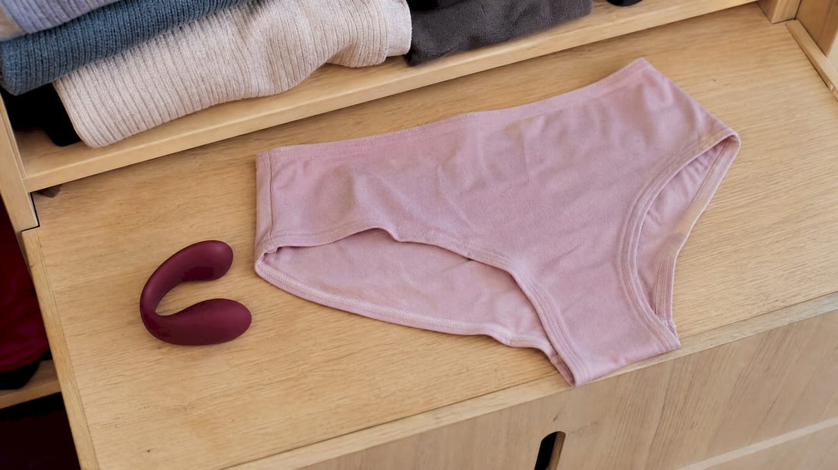 Wearable vibrator beside close-fitting underwear